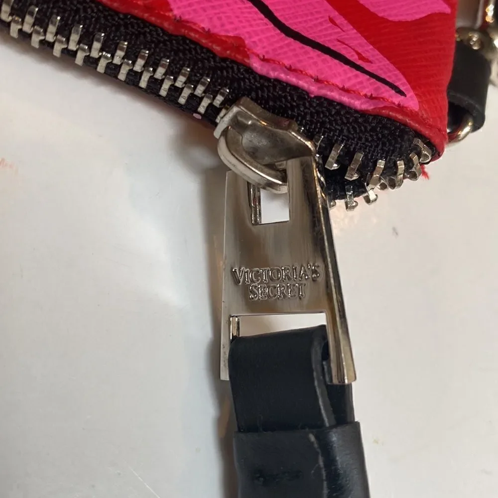 Red coated canvas Victoria’s Secret large wristlet make up bag